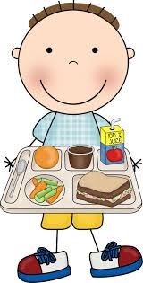  young boy holding tray with lunch on it